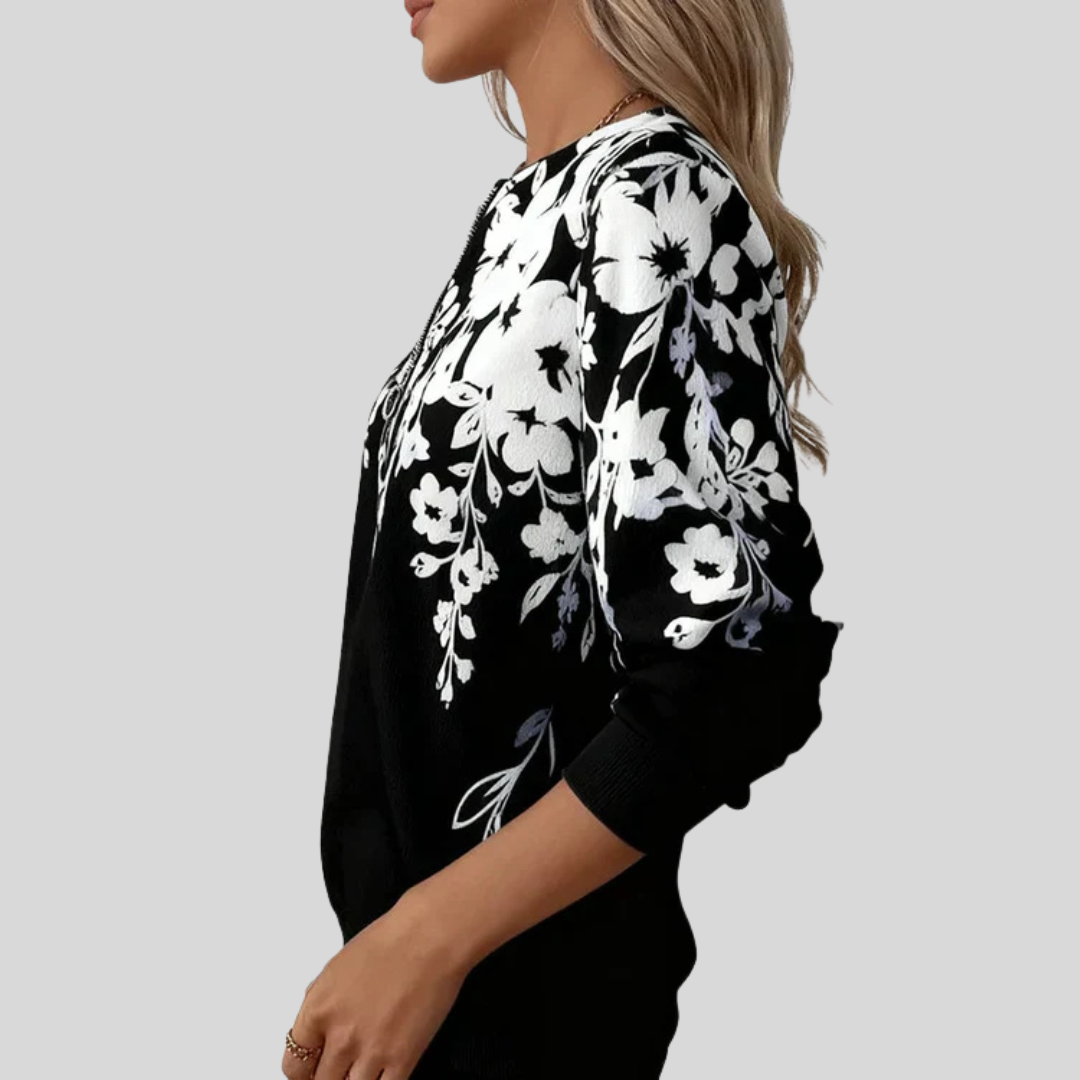 Juani | Sudadera Negra con Flores Blancas y Cremallera