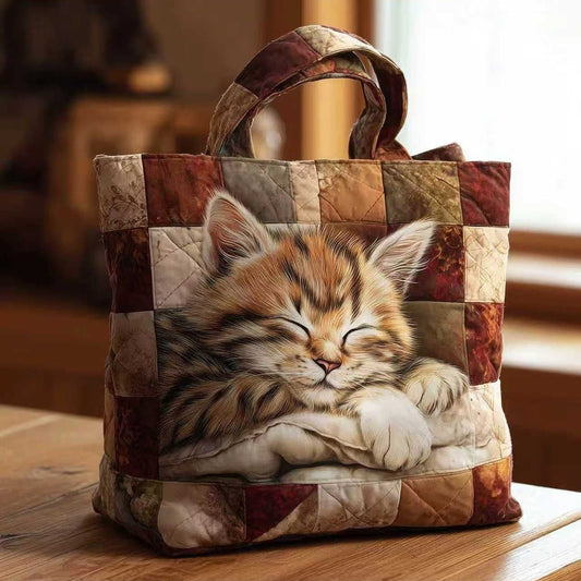 Bolso tote acolchado con gatito naranja dormido